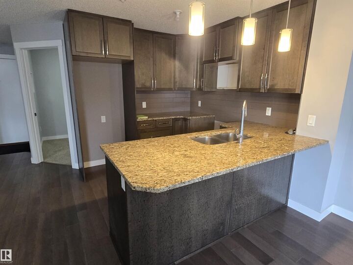 Property Photo: 2207 44 Avenue NW 314 AB T6T 0W6
