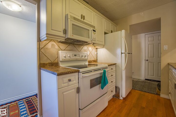 Property Photo: 12303 Jasper Avenue NW 1703 AB T5N 3K7