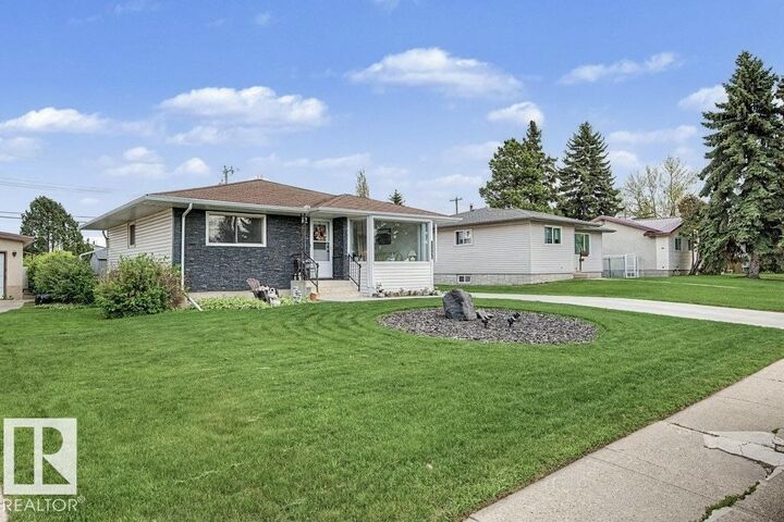Property Photo: 13523 65 Street NW AB T5A 1A5