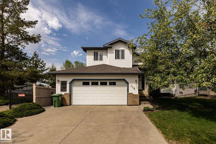 Property Photo: 114 Reichert Drive AB T4X 1P2