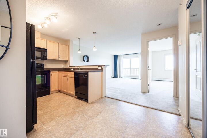 Property Photo: 5951 165 Avenue NW 404 AB T5Y 0J6