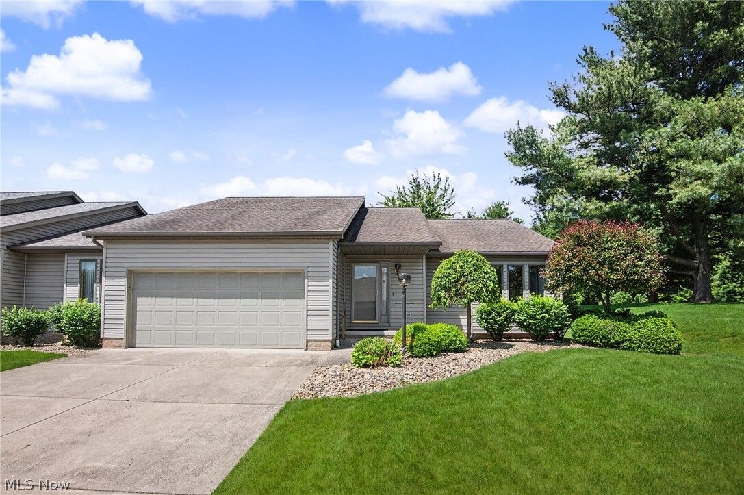 Property Photo: 2345 Whispering Meadows Drive NE B OH 44483