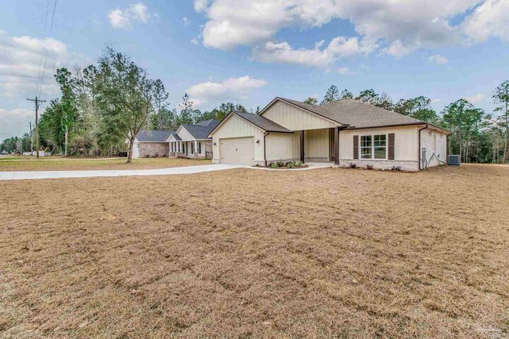 Property Photo:  4298 Watkins St  FL 32571 