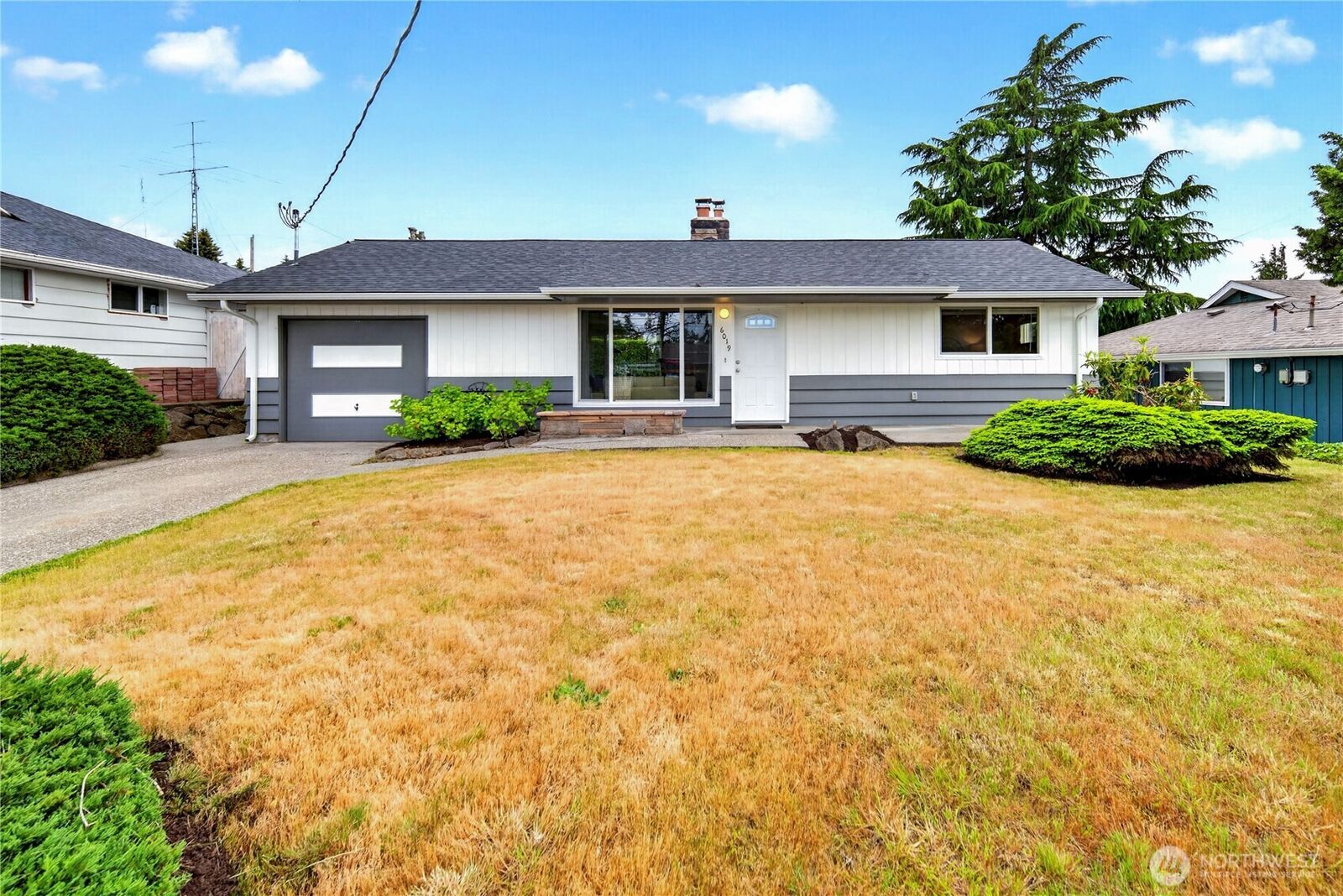 Property Photo:  6019 S 118th Place  WA 98178 
