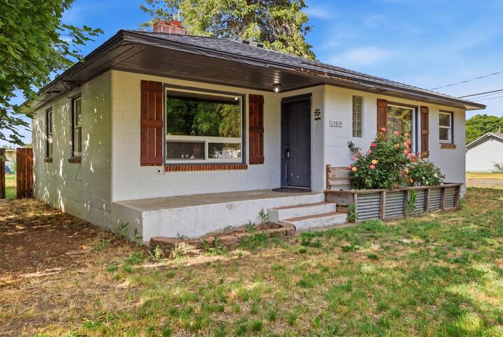 Property Photo: 13019 E 8th Ave WA 99216
