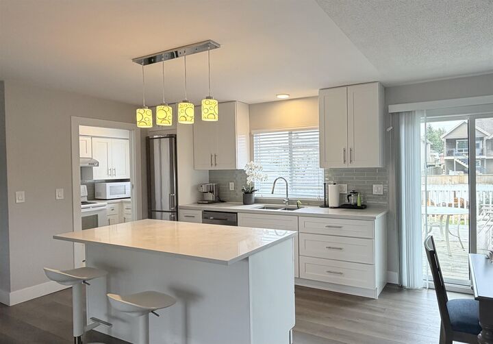 Property Photo:  11647 81A Avenue Main House  BC V4C 2A8 