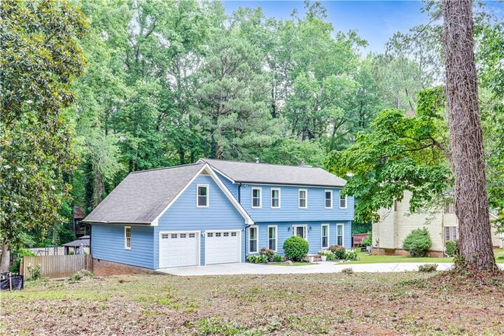 Property Photo:  5168 Hidden Hills Trace  GA 30088 