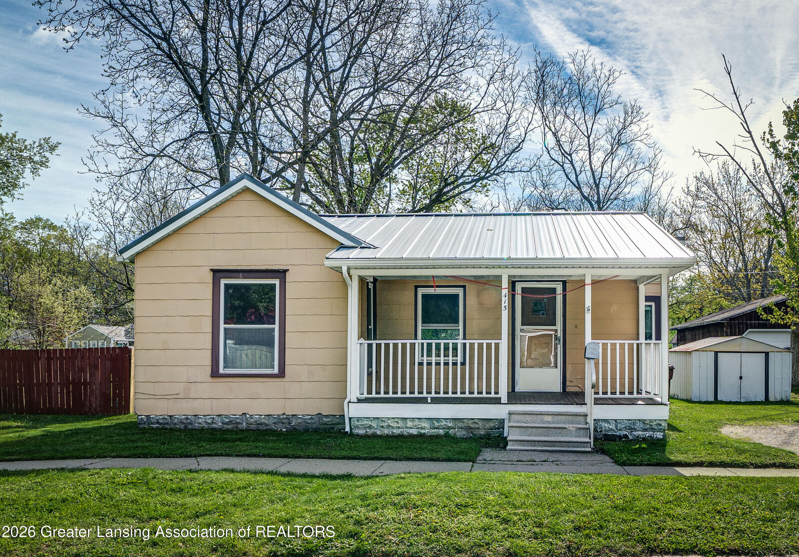 Property Photo:  415 Fulton Street  MI 48895 