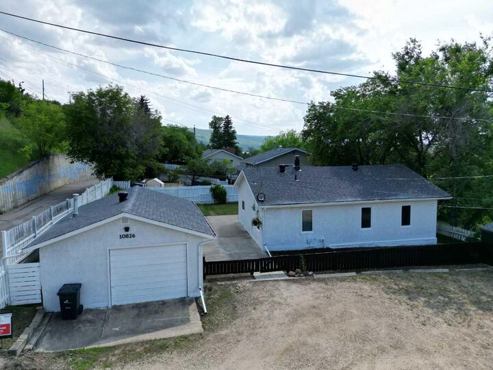 Property Photo:  10826 103A Street  AB T8S 1L5 