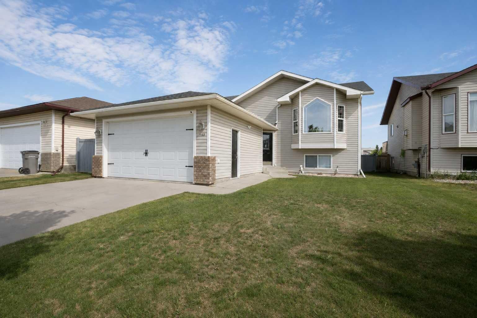 Property Photo:  9102 129 Avenue  AB T8X 1R5 