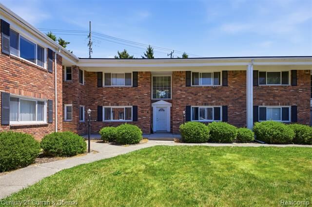 Property Photo:  31831 Grand River Avenue 85  MI 48336 