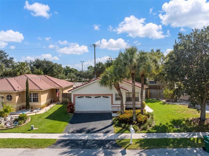 Property Photo:  7950 NW 24th St  FL 33063 