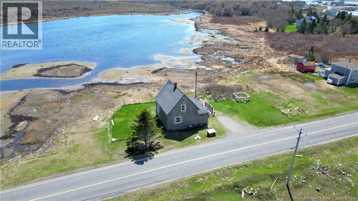 Property Photo:  202 White Head Road  NB E5G 1K6 