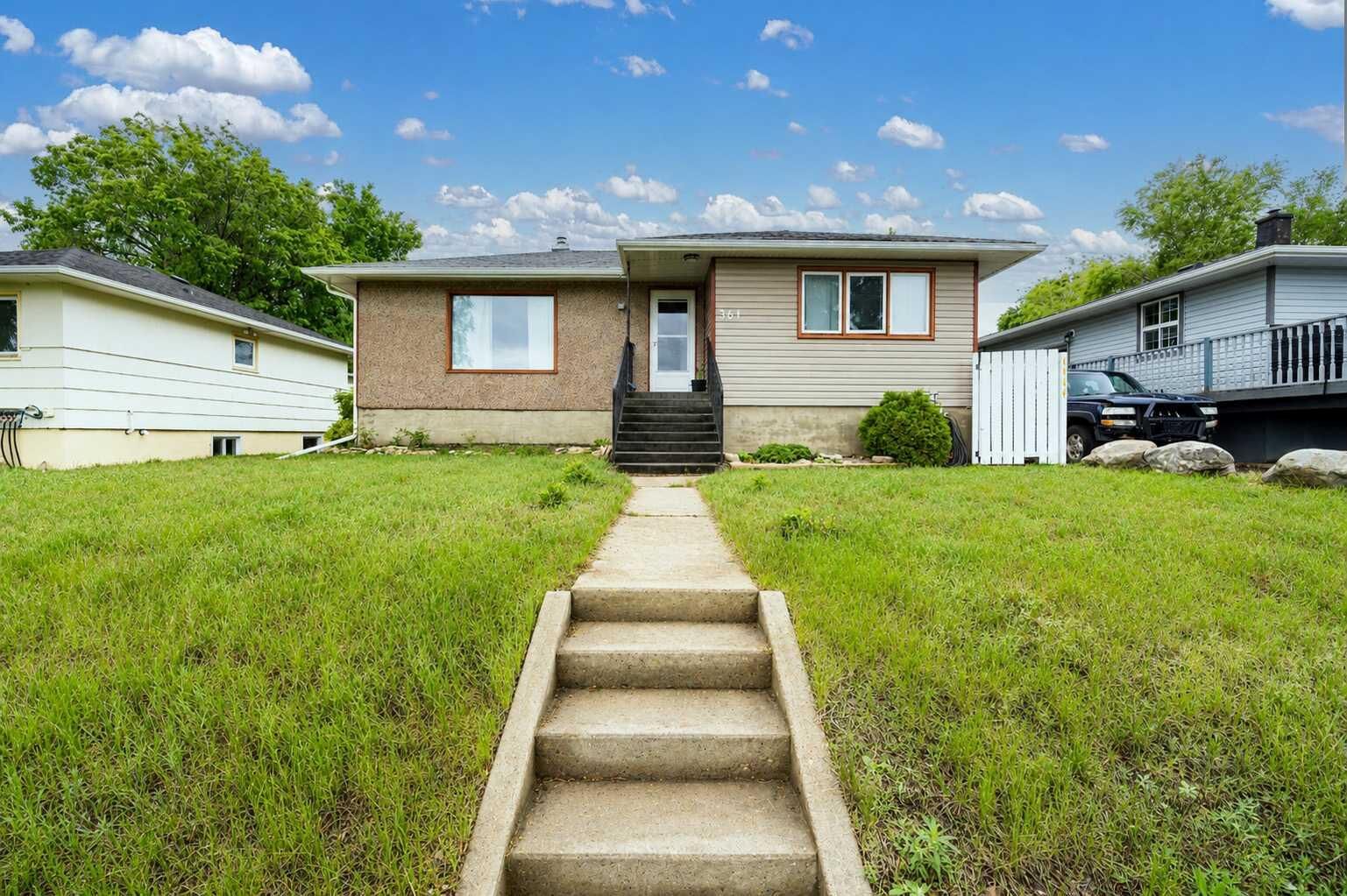Property Photo:  361 7 Street SW  AB T1A 4K3 