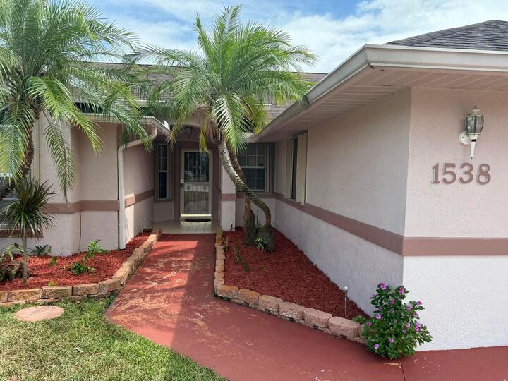 Property Photo:  1538 SW Neptune Avenue  FL 34953 