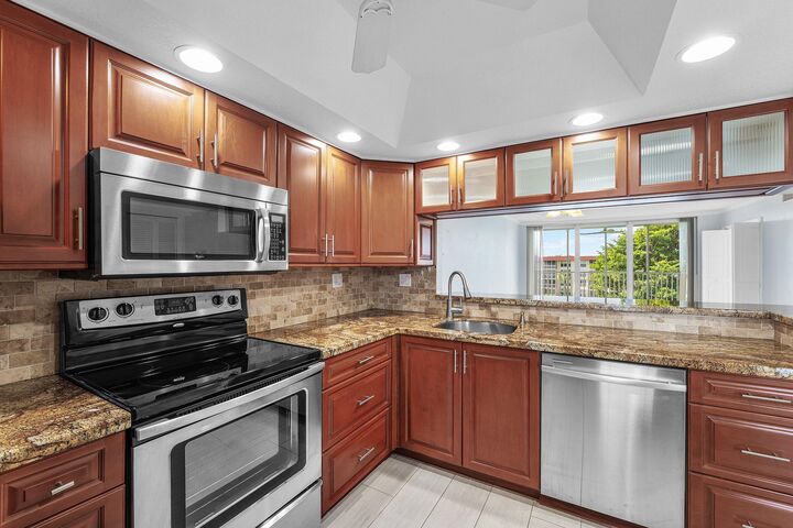 Property Photo:  3150 NE 48th Court 411  FL 33064 