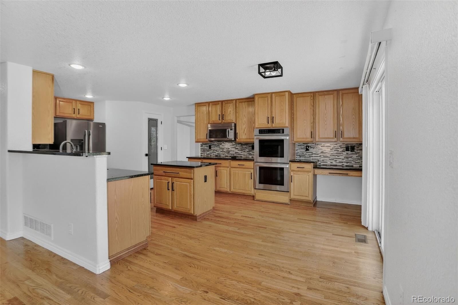 Property Photo:  14942 Vine Street  CO 80602 