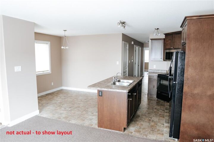 Property Photo: 137 St John Street N SK S4R 2V8