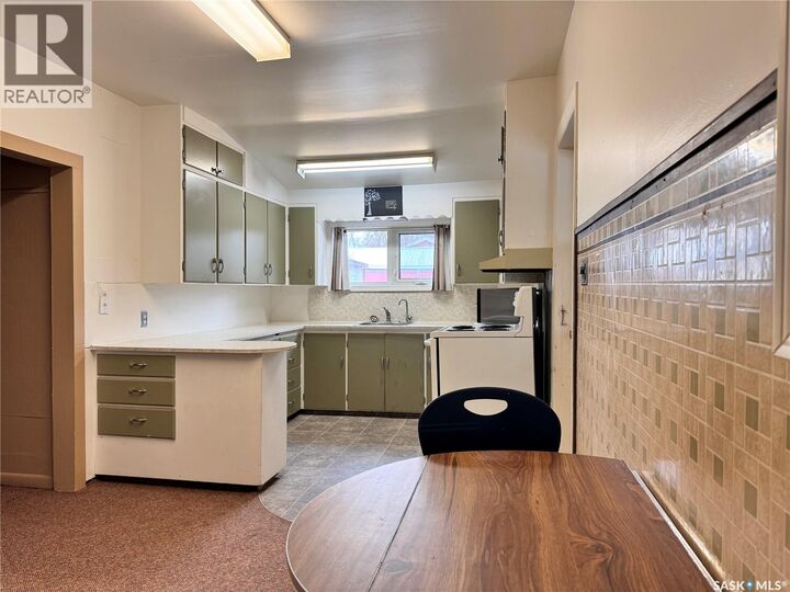 Property Photo:  309 A Avenue E  SK S0A 4T0 