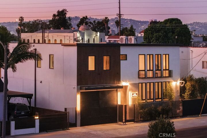 Property Photo:  2619 S Rimpau Blvd  CA 90016 