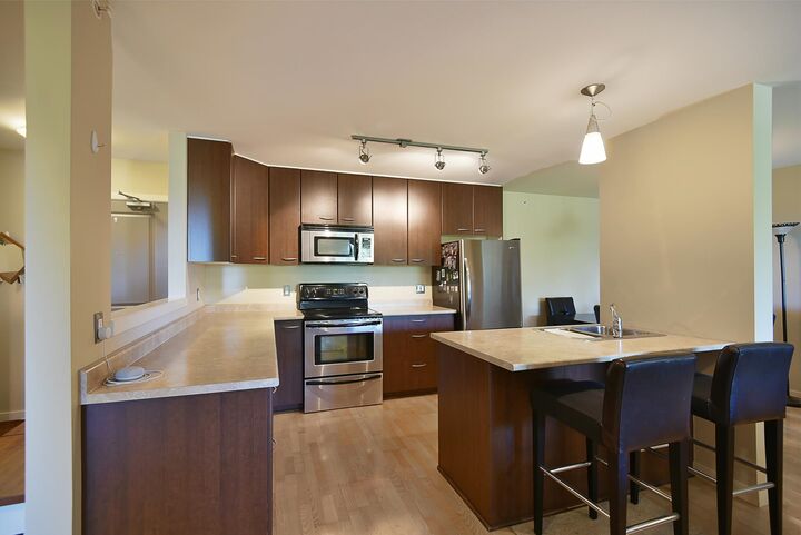 Property Photo:  5631 Inlet Avenue 403  BC V7Z 0J1 