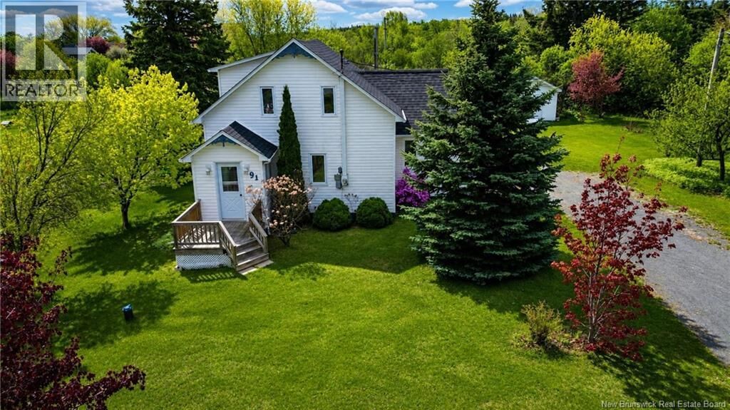 Property Photo:  91 Rue Du Parc Ouest  NB E8J 2Y1 