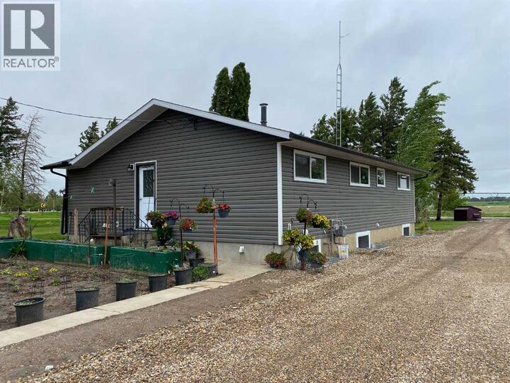 Photo de la propriété:  190080 140 Range Road  AB T1R 1B3 