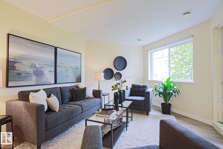 Property Photo: 6925 199 Street NW 211 AB T5T 3X8