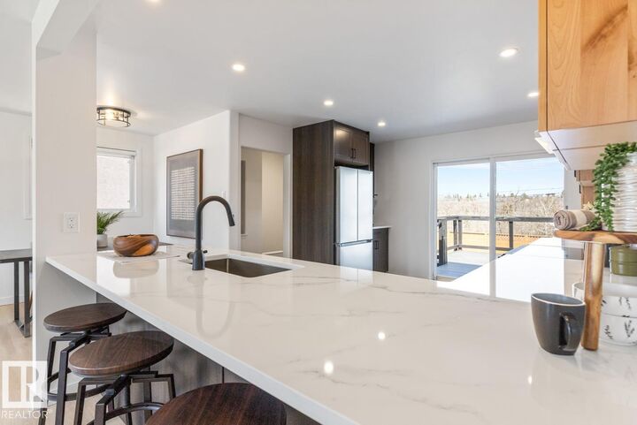 Property Photo:  4508 109A Avenue NW  AB T6A 1S4 