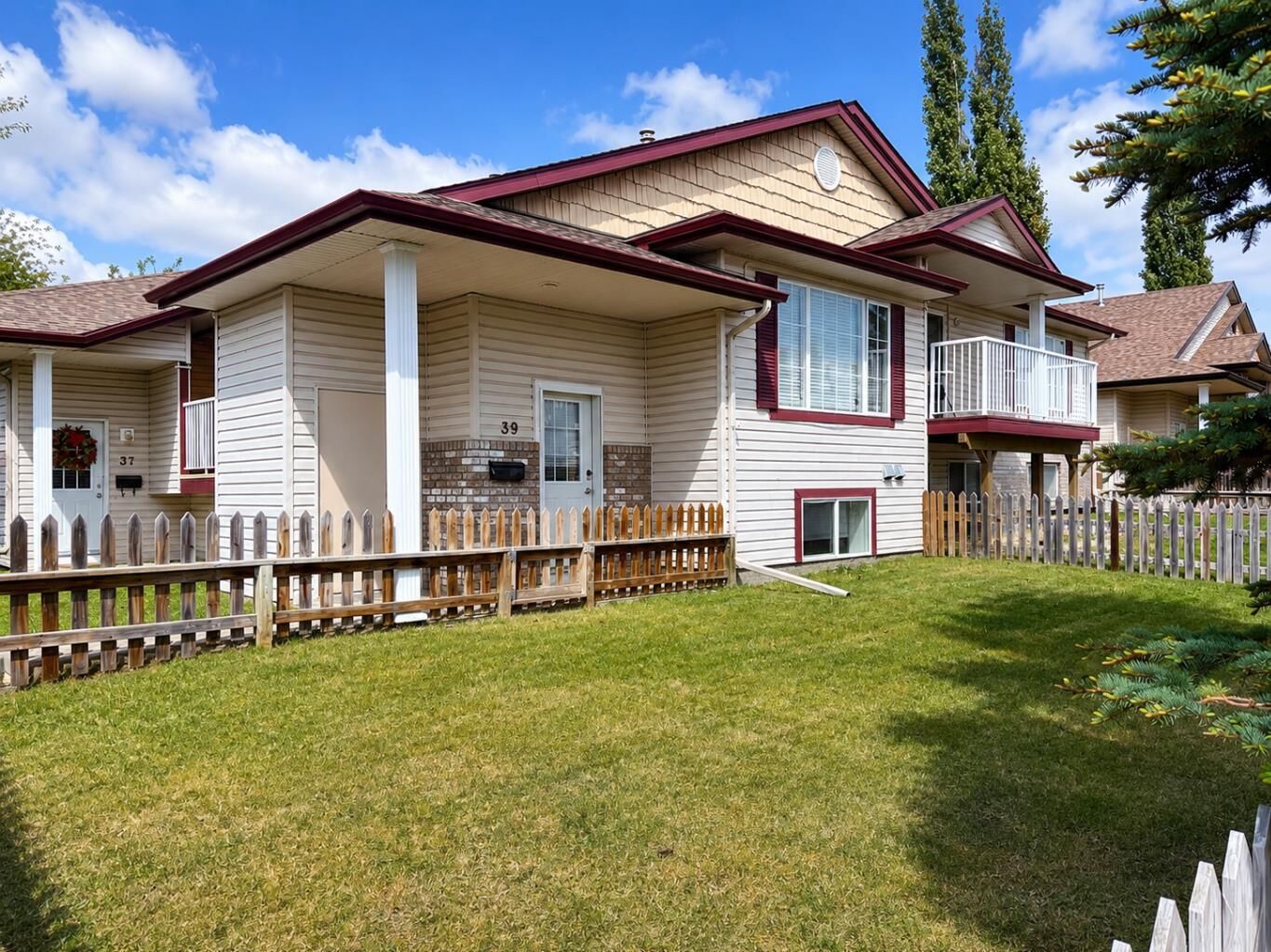 Property Photo: 103 Addington Drive 39 AB T4R 3C6