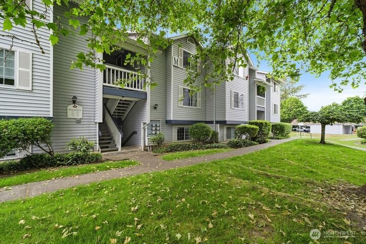 Property Photo:  7453  Newcastle Golf Club Road M203  WA 98059 