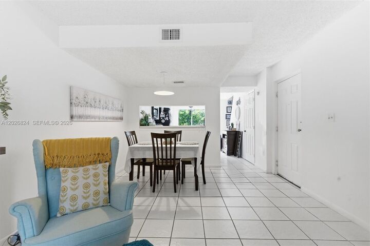 Property Photo:  8240 SW 149th Ct 7-201  FL 33193 