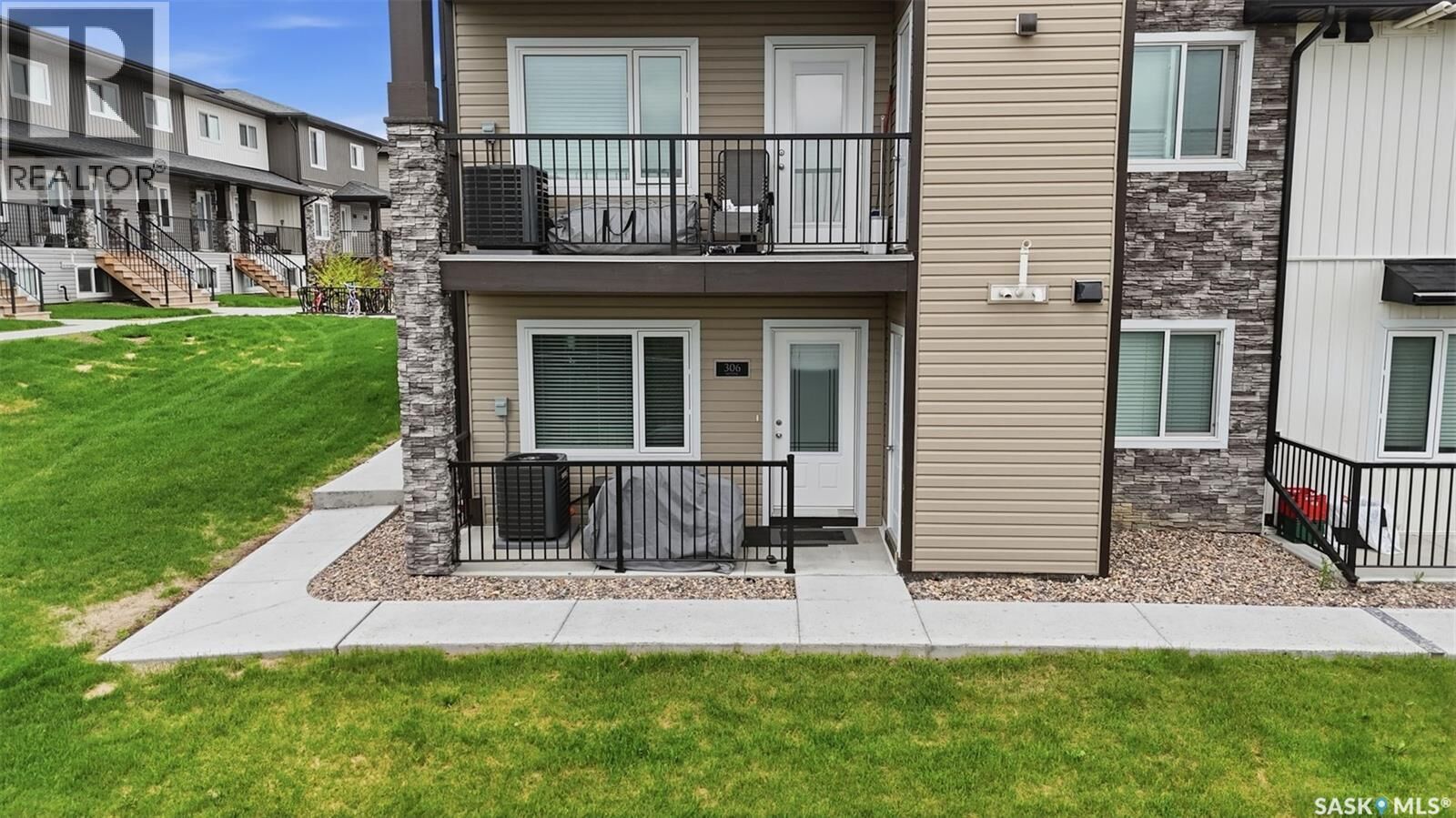 Property Photo:  306 110 Akhtar Bend  SK S7W 0Y9 