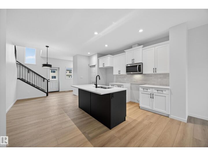 Property Photo: 217 Wattle Rd AB T9E 0V1