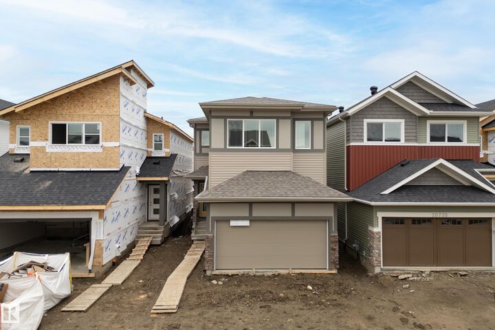 Property Photo:  20731 24 Avenue NW  AB T6M 2C4 