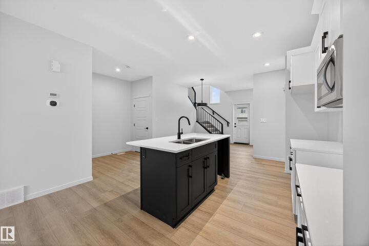 Property Photo: 217 Wattle Road AB T9E 0V1