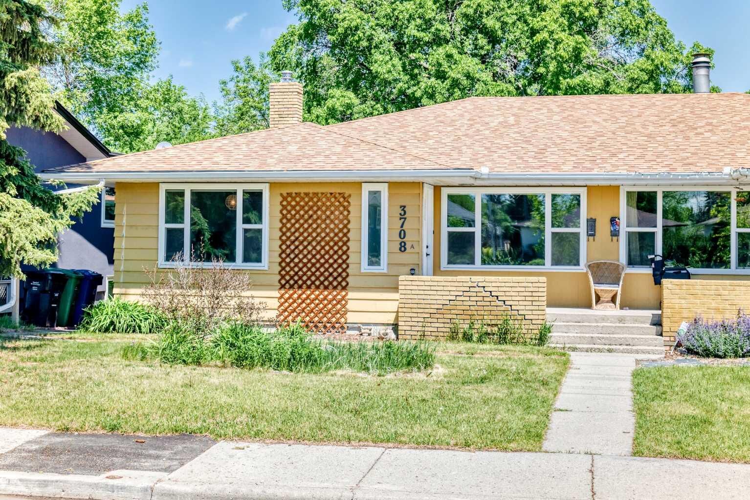 Property Photo:  3708A Spruce Drive SW  AB T3C 3A7 