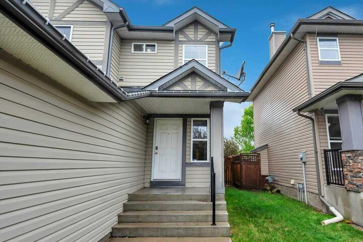 Property Photo:  142 Ranch Ridge Court  AB T1P 0A5 