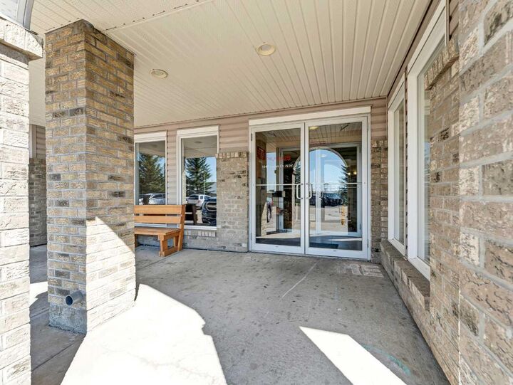 Property Photo:  1648 Saamis Drive NW 215  AB T1C 4X1 