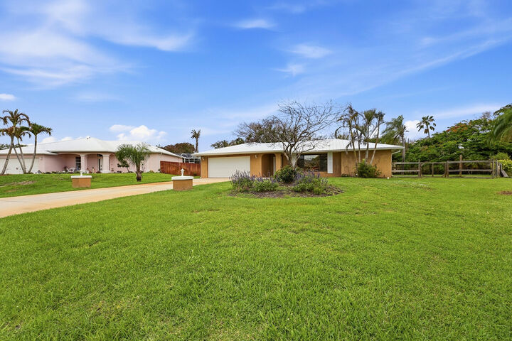 Property Photo:  2402 SE Perugia Street  FL 34952 