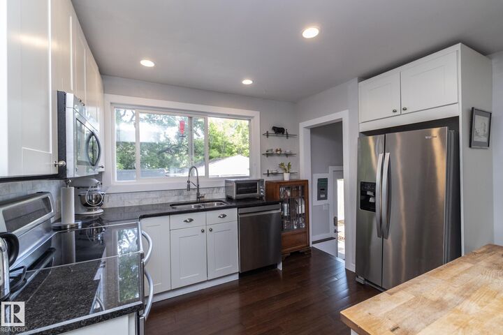 Property Photo:  7719 86 Avenue NW  AB T6C 1H6 