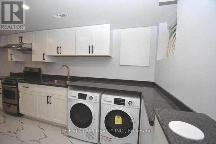 Property Photo:  133 Coxwell Avenue East Bsmt  ON M4L 3B4 
