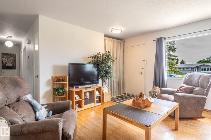 Property Photo: 13816 62 Street NW AB T5A 1P7