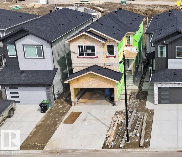 Property Photo: 105 Wyatt Ridge AB T8L 0Y3