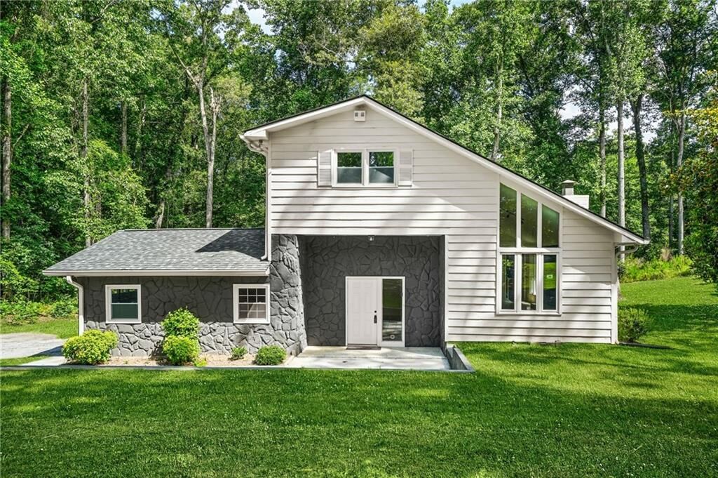 Property Photo:  6985 Butner Road  GA 30349 