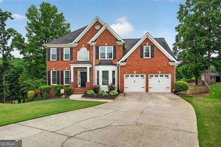 Property Photo:  933 Hawk Creek Trail  GA 30043 