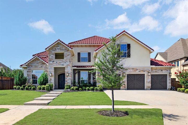 Property Photo: 689 Dancing Water Drive TX 75036