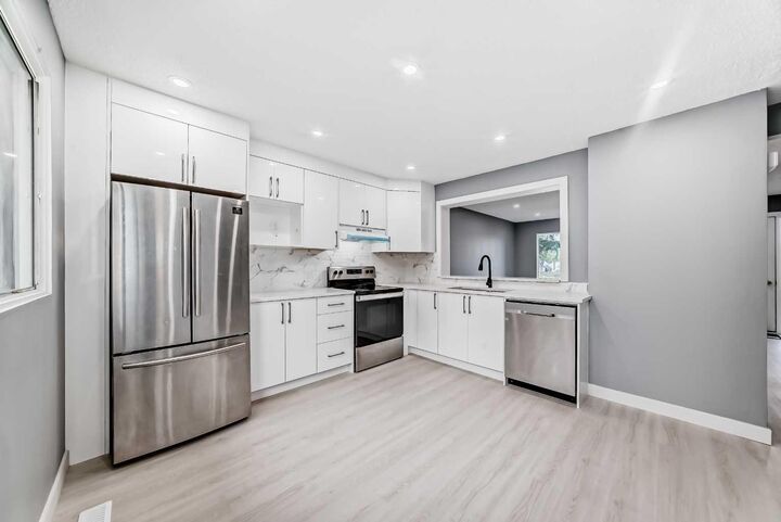 Property Photo: 232 Marlborough Way NE AB T2A 6R9