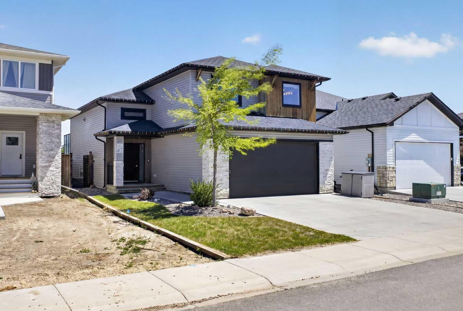 Property Photo:  47 Rivergrove Lane W  AB T1K 8E8 