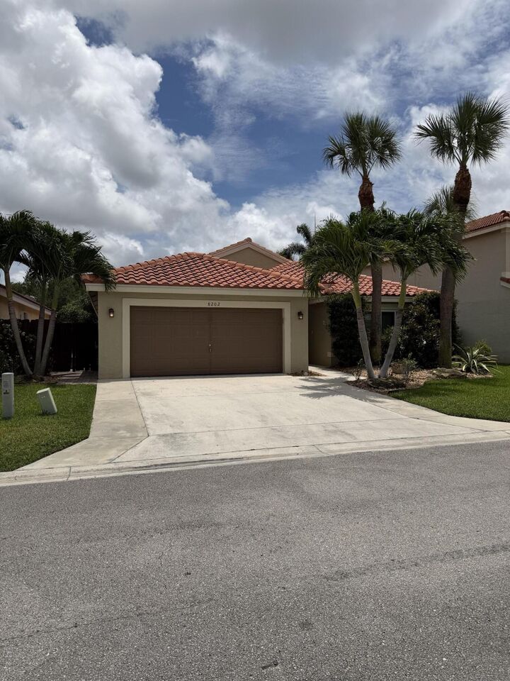Property Photo: 8202 White Rock Circle FL 33436